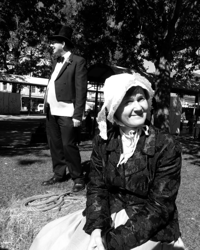 Woman Sitting Man Standing