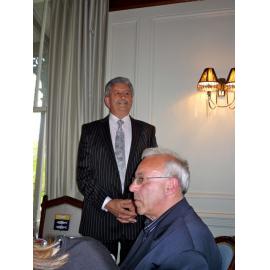 Wayne Idour adressing guests at celebration dinner