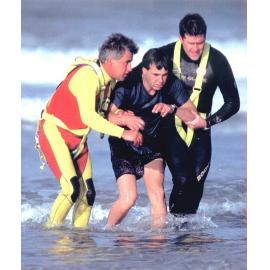 Survivor assisted to shore 