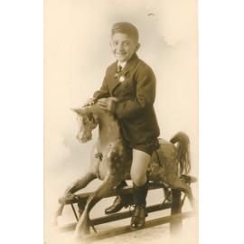 Scotty Isaac on rocking horse
