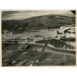 Taieri River in flood at Outram - 1958