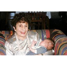 Latifie Kallil holding Joel McGuinn