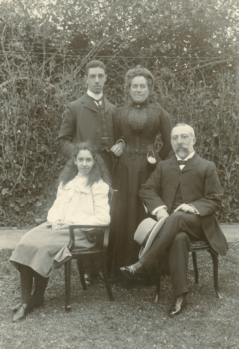 Photograph of the Theomin family. Edward and Marie, standing. Dorothy and David, seated. 