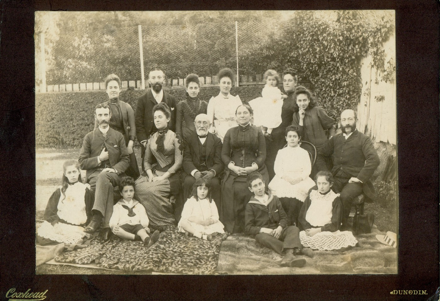 Michaelis family group at Dunedin 1889. Back row: Florence Hart, David Theomin, May Baruch (later Barden), Lucie (Hallenstein), Dorothy Theomin, Marie Theomin, Alice Michaelis. Centre: Hyam Hart, Helene Isaacs, Mr & Mrs Moritz Michaelis, Florrie Isaacs (Cohen), Jack Isaacs. Front row: Brightie Hart (Phillips), E M Theomin, Clare Isaacs, Arthur Isaacs (later name changed to Harding), Helene Hart (Phillips). 
