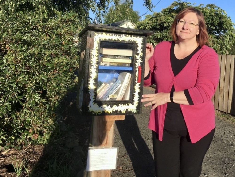 Pictured: one of the Lilliput Libraries with a 'guardian'. Photo credit: Kay Mercer