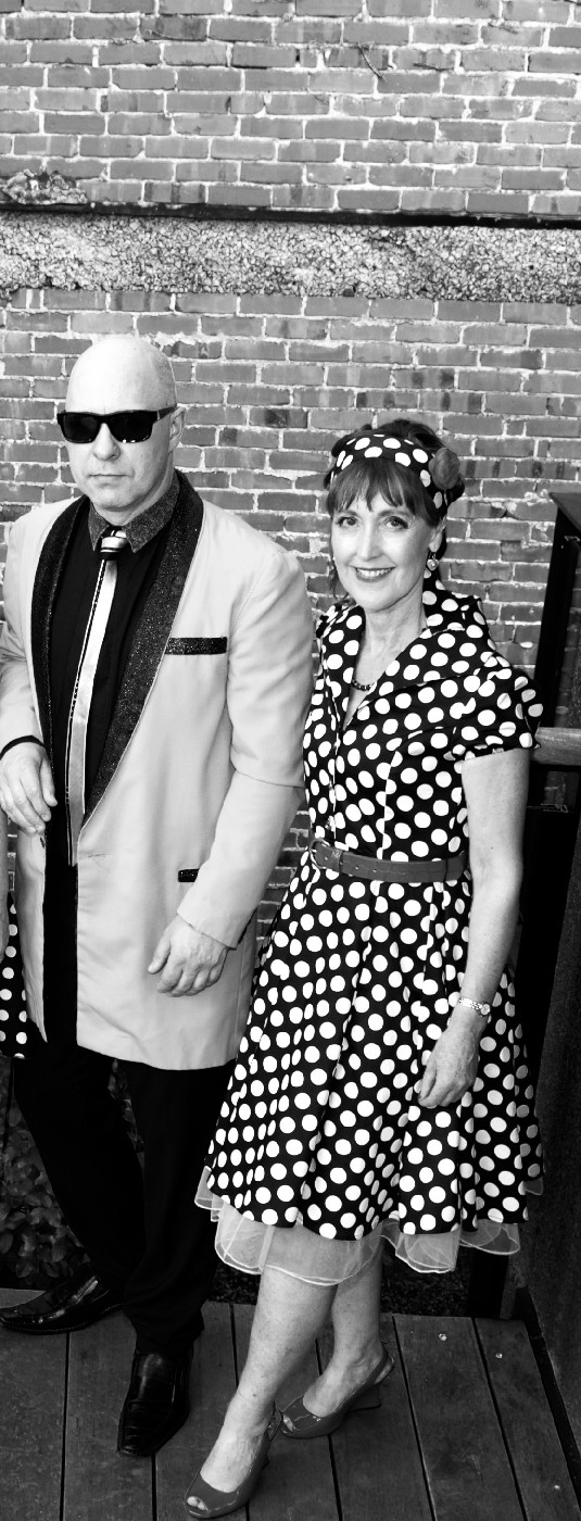 Pictured: John Sule (left) with fellow founder member of Both Sides of the Line, Glenda Rogers. Photo credit: Both Sides of the Line