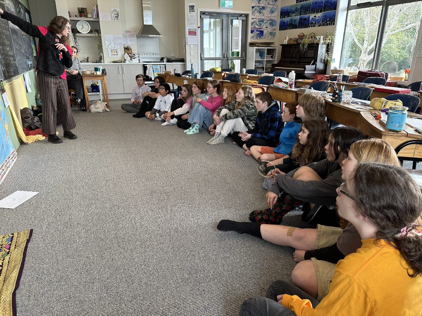 City of Literature South D Poet Lorikeet, Jenny Powell with a Class Kererū
Photo credit: Trisha Geraets (Teacher for Year 7&8 class, Dunedin Rudolf Steiner School)