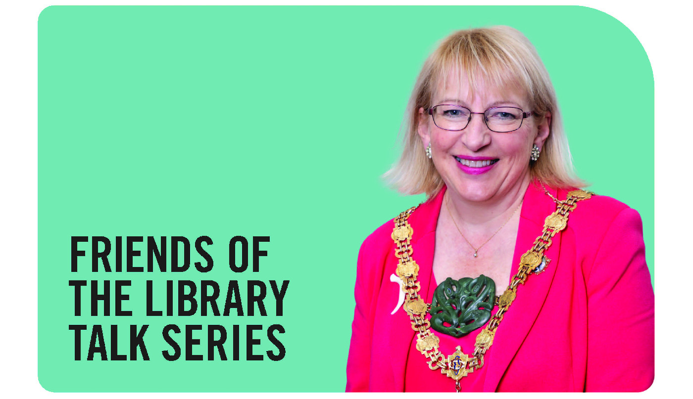 The Mayor looks at books 